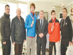 GHSİM şampiyon taekvondocuları kutladı