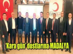 Kara gün dostlarına MADALYA