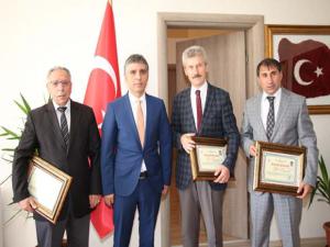 Oltuya yön verenlere teşekkür belgesi